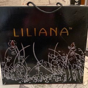 Beautiful red denim peep toe booties with studs.